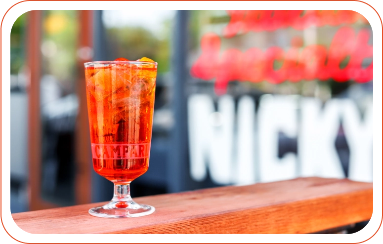 A cocktail sits on a table at Uncle Nicky's, part of its Austin happy hour.