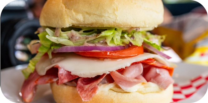 Close-up of a Mambo Italiano, a signature sandwich of an Austin Italian restaurant.
